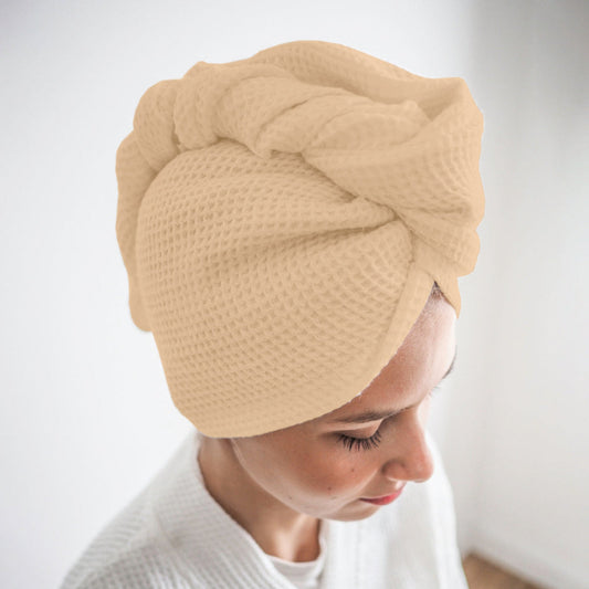 Beige cotton hair wrap towel worn after shower