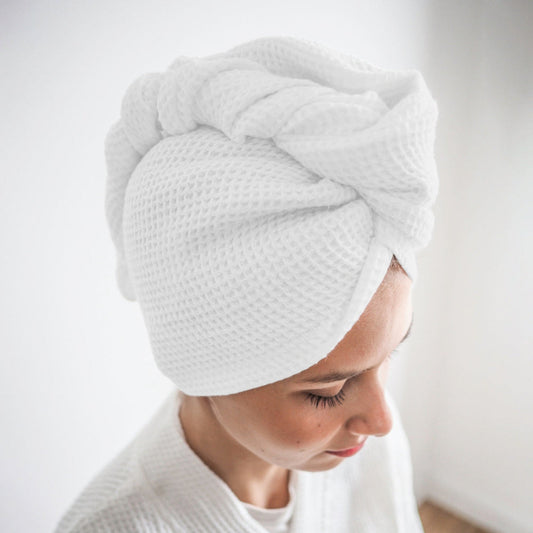White cotton hair wrap towel worn after shower