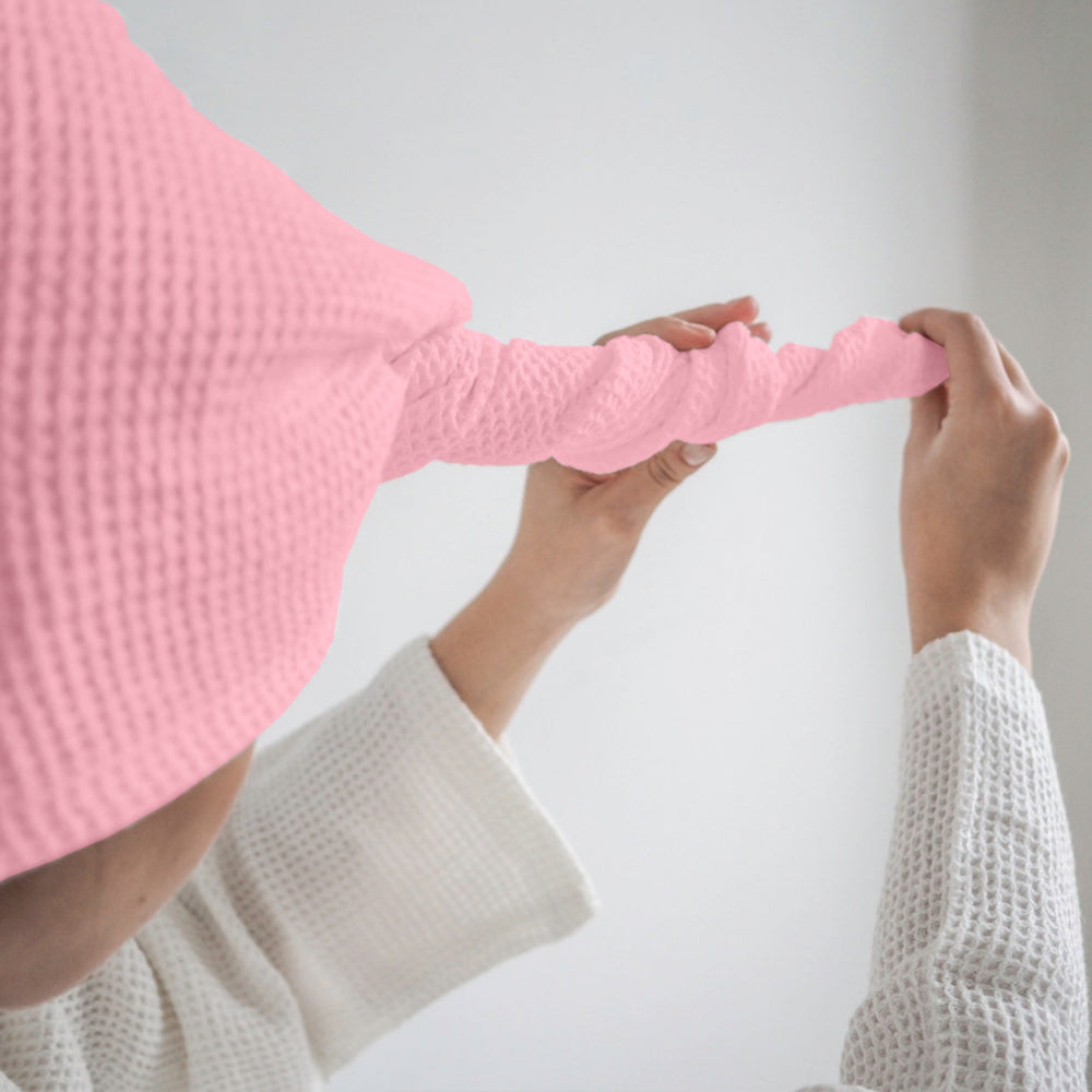 Pink waffle hair wrap towel twist and button detail