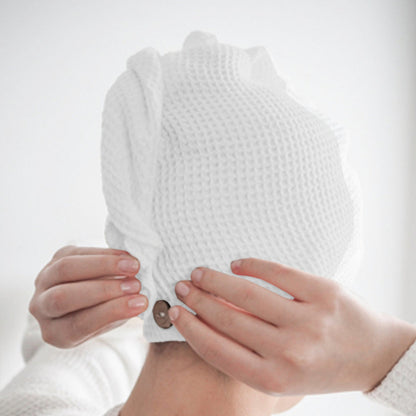 White cotton hair wrap towel spread flat