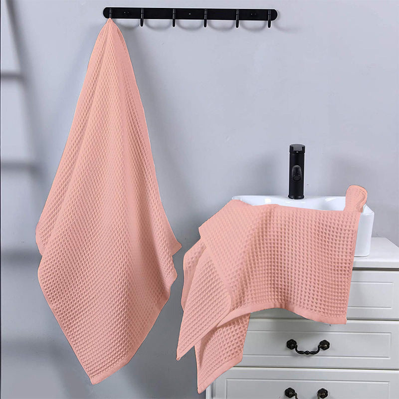 Peach cotton waffle hand towel folded view