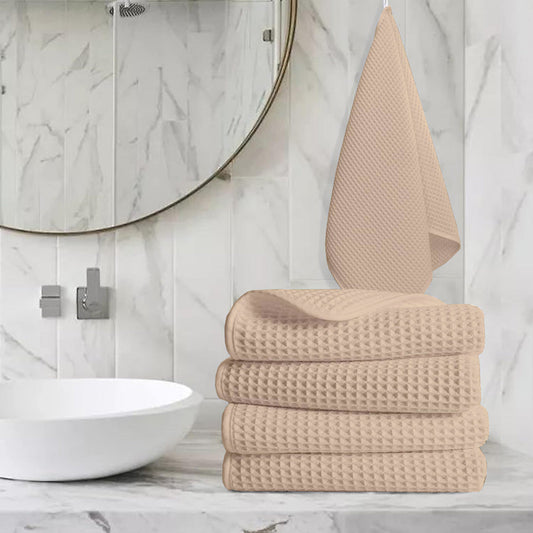 Pure cotton waffle hand towel in beige on towel rail