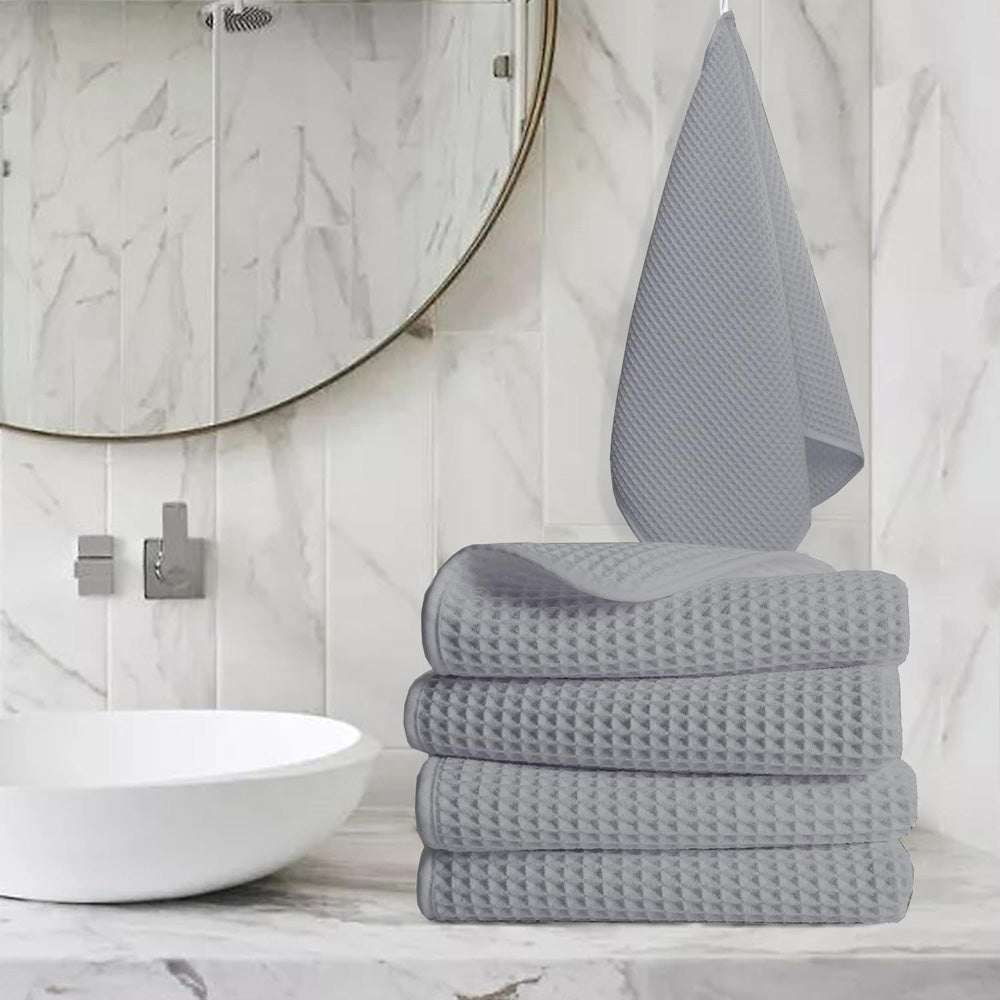 Pure cotton waffle hand towel in silver on towel rail