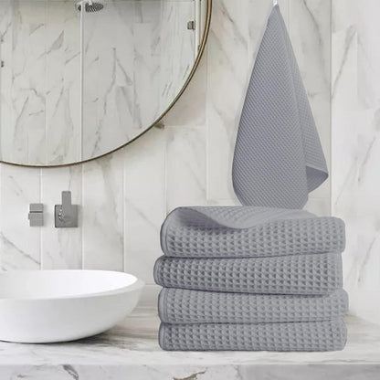 Pure cotton waffle hand towel in silver on towel rail