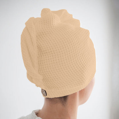 Beige waffle hair wrap towel fabric close-up