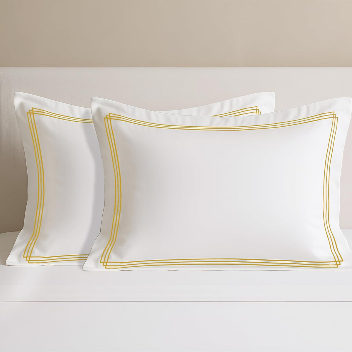 Pure cotton 500 TC premium pillow cover set in white with triple golden stripes